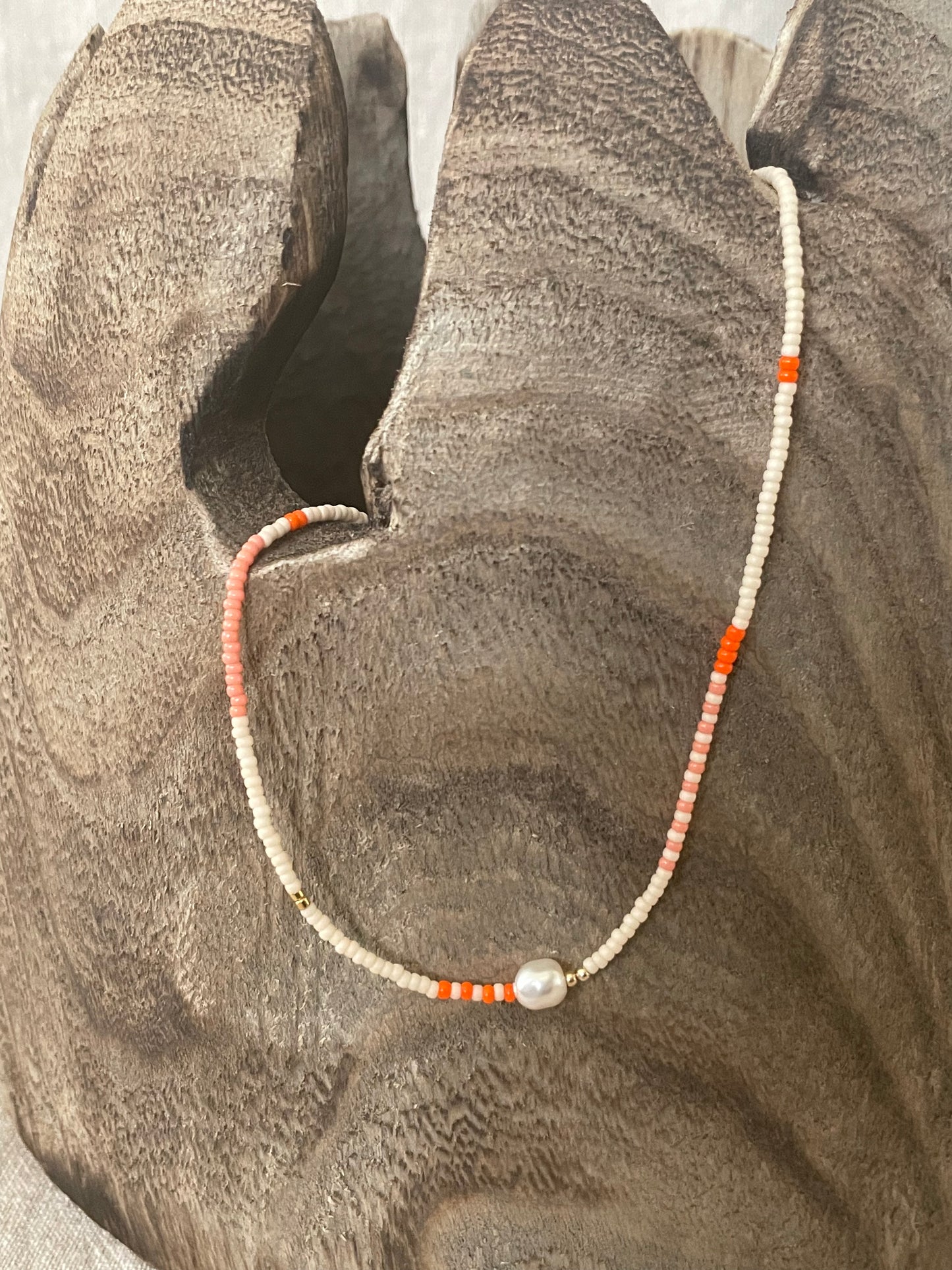 Zebra pearl collier oranje