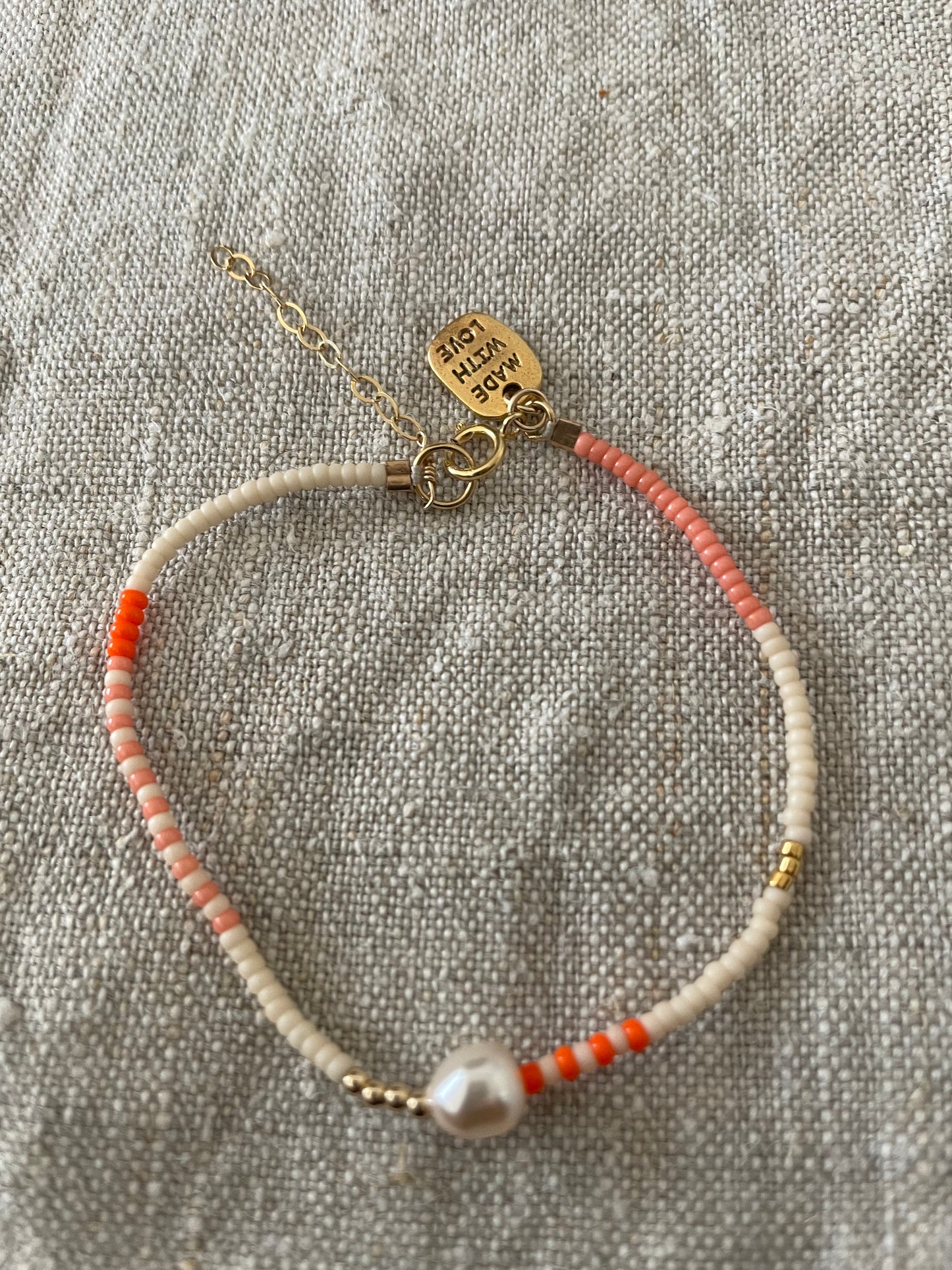 Zebra pearl crystal armband oranje